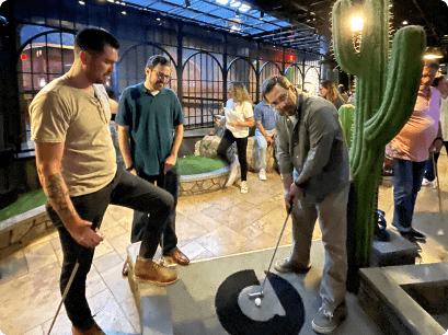 TechGrid Team Playing Indoor Putt Putt